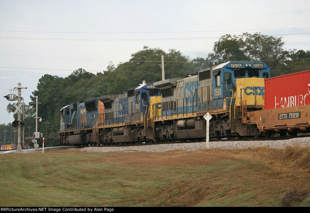 CSX 4718 leads 7643 and 7550